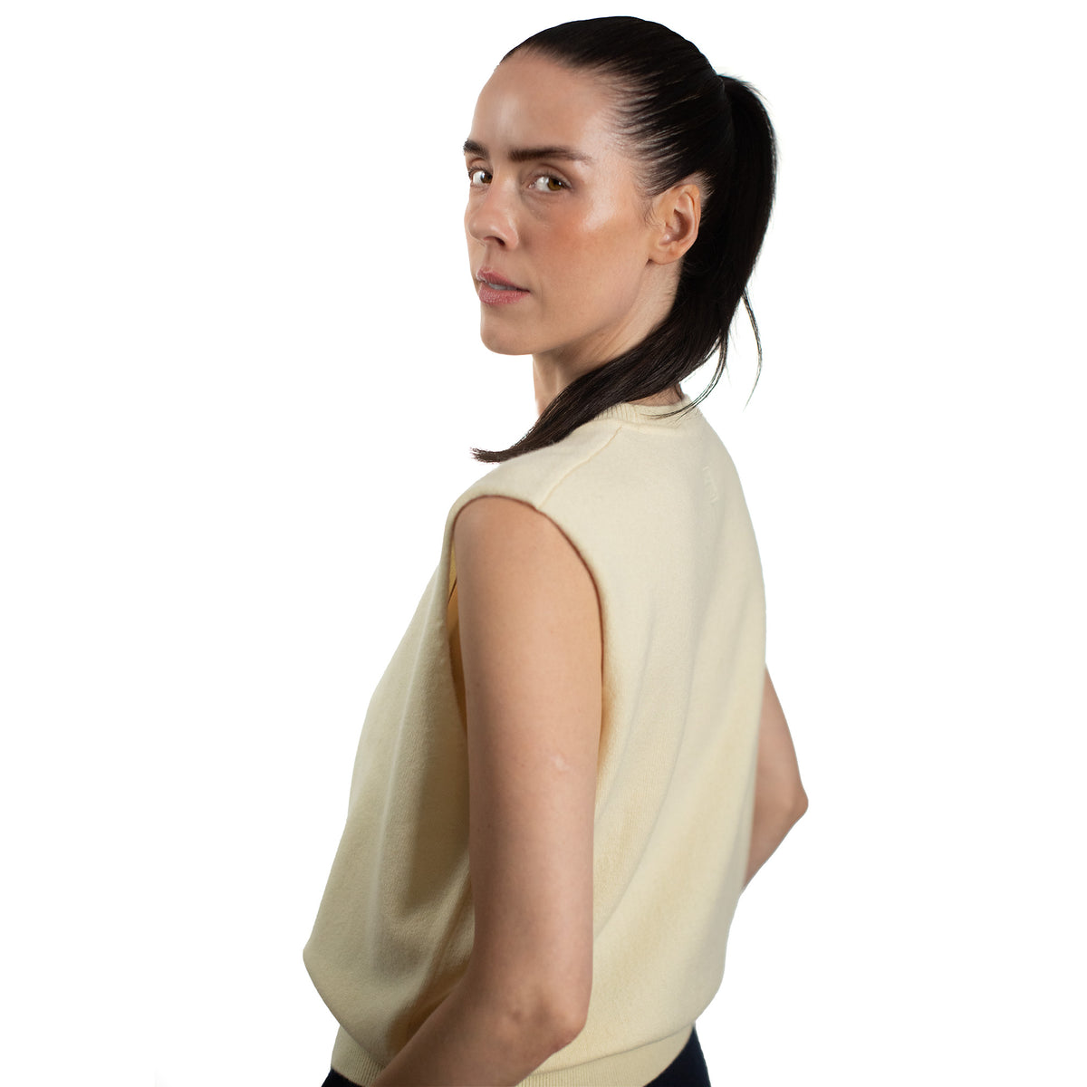 MA01 Cashmere Sleeveless Crewneck Sweater by Mawei, yellow cream, female model, side view