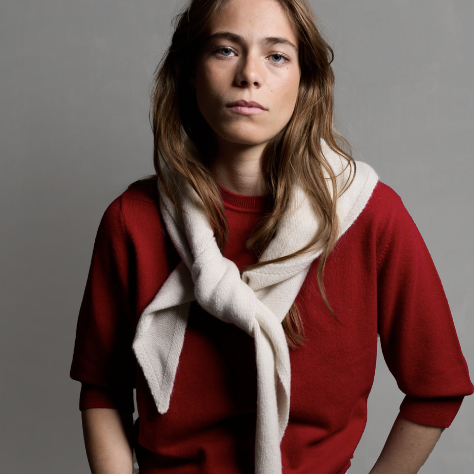 MA81 Cashmere Triangular Scarf by Mawei, off white, MA03 Cashmere Short Sleeve Crewneck Sweater, red, front view, female model.