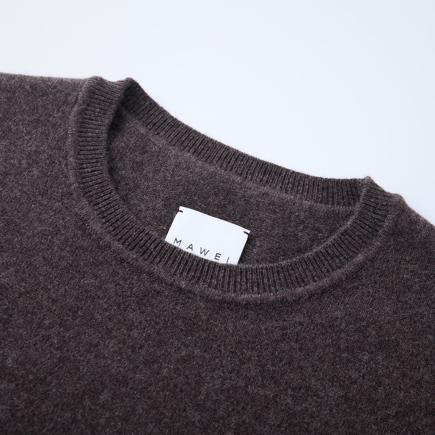 MA03 Cashmere Short Sleeve Crewneck Sweater by Mawei, brown, neck details close-up.