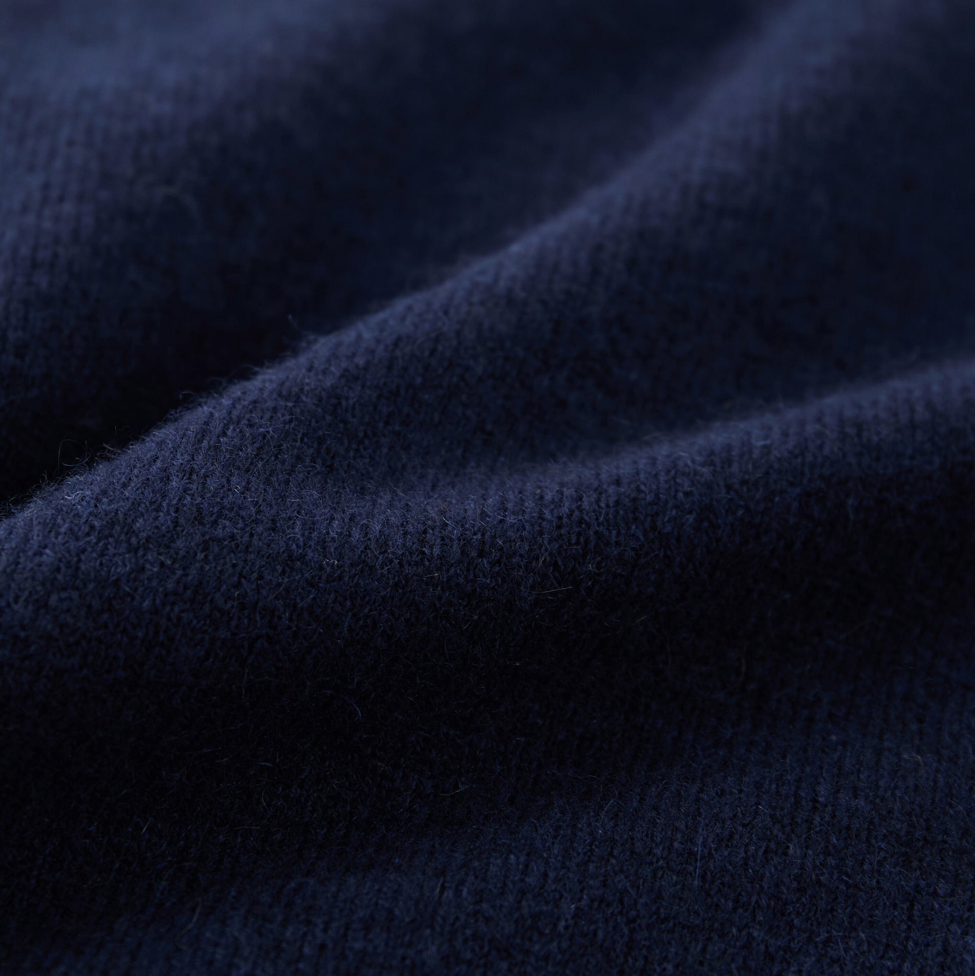 Cashmere Sweater by Mawei, navy blue fabric detail close-up.