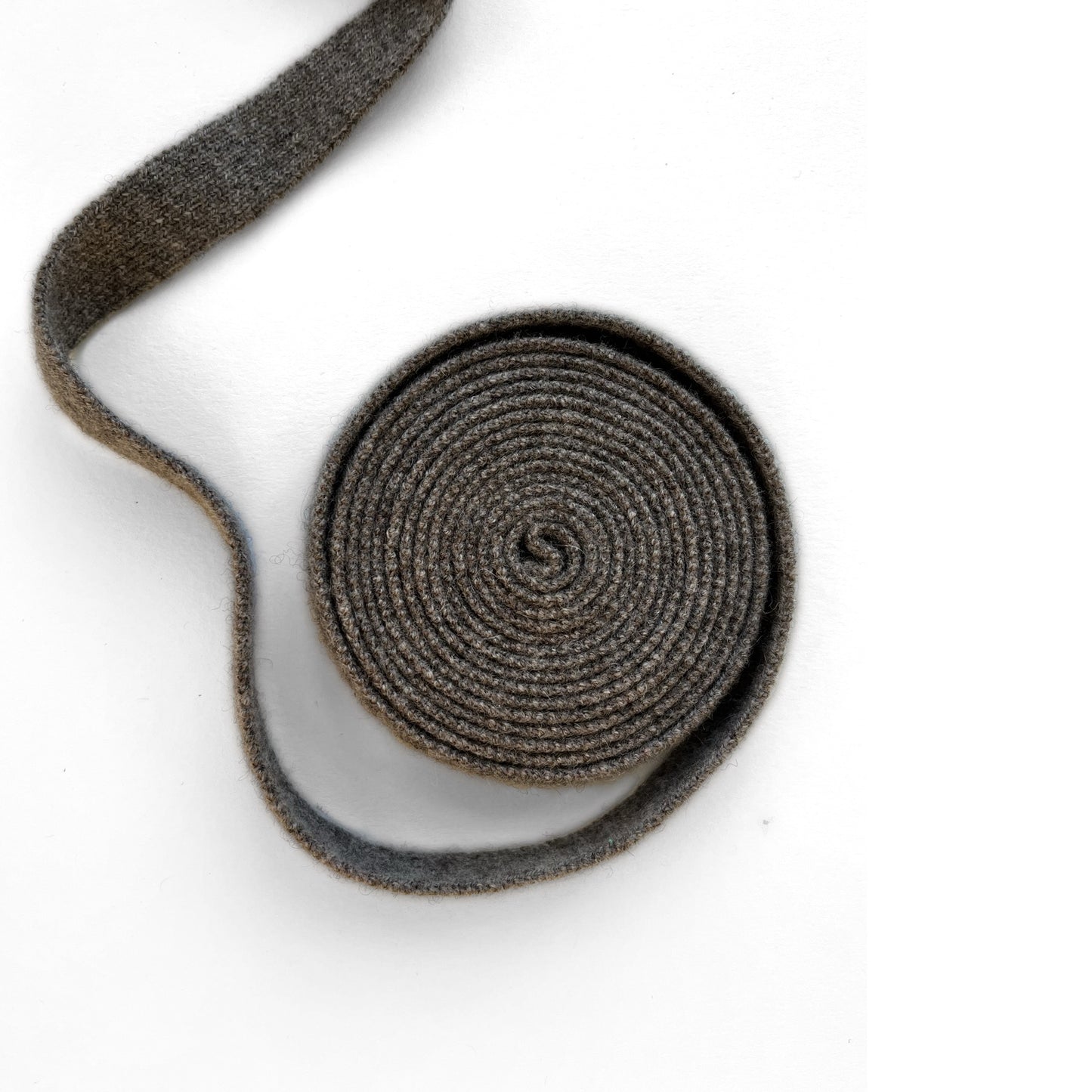 MA91 Cashmere Ribbon by Mawei, brown and grey, roll, belt, hair band, hair string, close up.