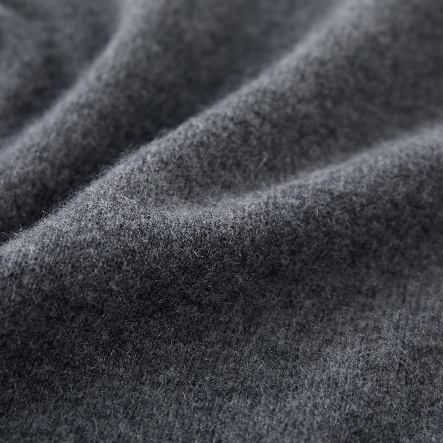 MA03 Cashmere Short Sleeve Crewneck Sweater by Mawei, grey, texture detail close-up.