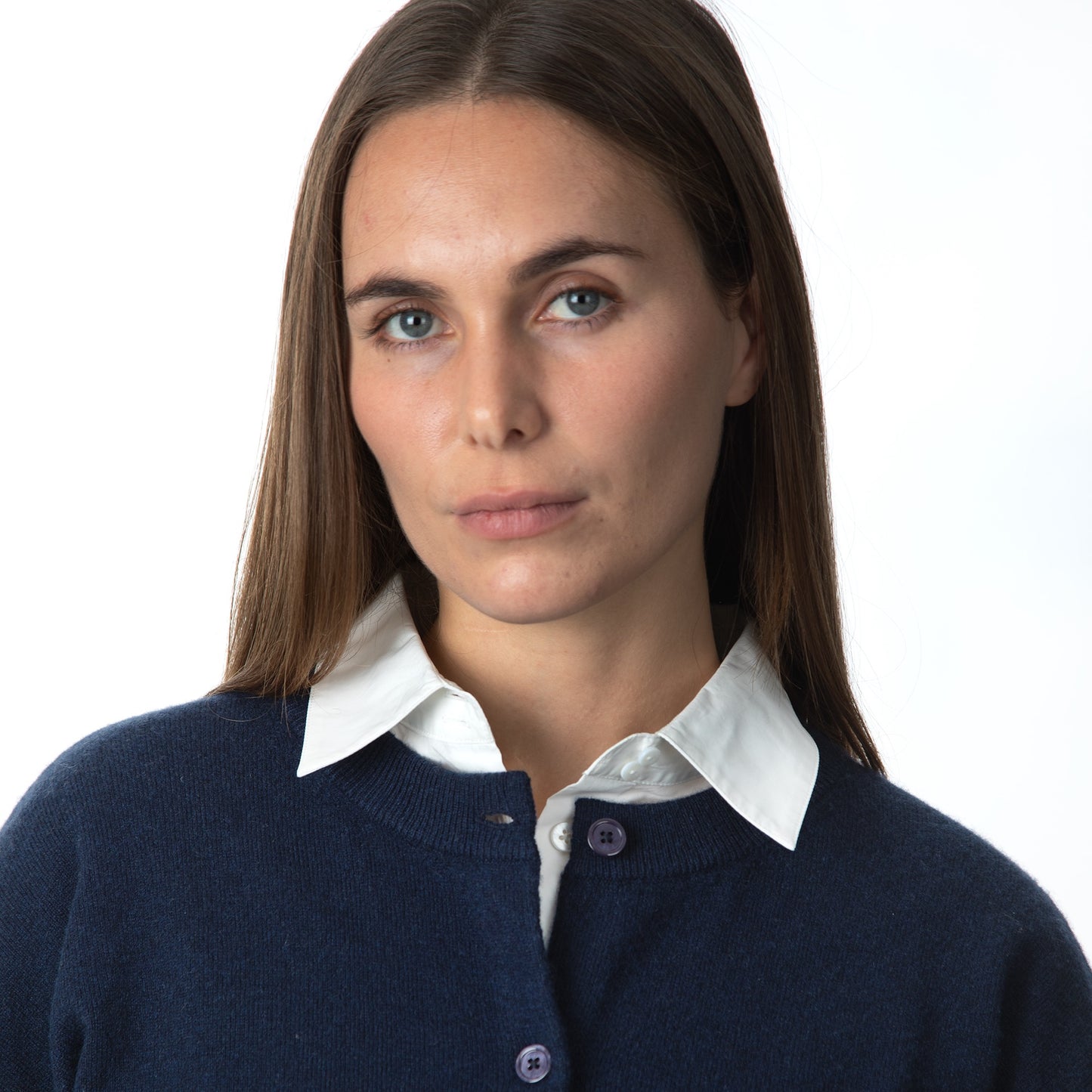 MA06 Cashmere Crewneck Cardigan by Mawei, navy blue, front view, close up neck, buttons, female model.