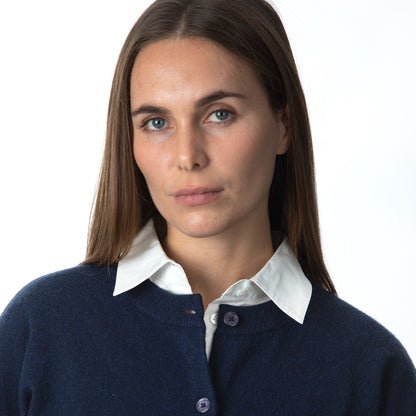 MA06 Cashmere Crewneck Cardigan by Mawei, navy blue, front view, close up neck, buttons, female model.
